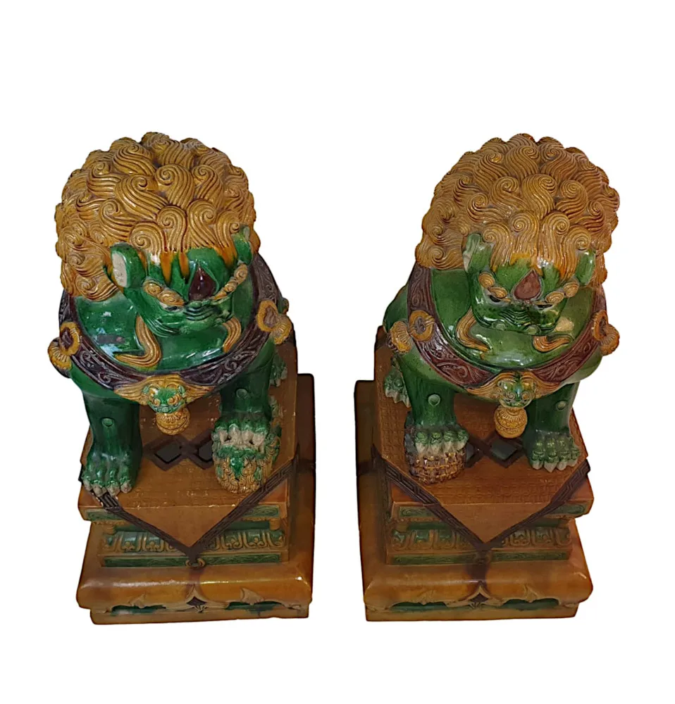 A Rare and Important Pair of Early 20th Century Chinese Export Foo Dogs