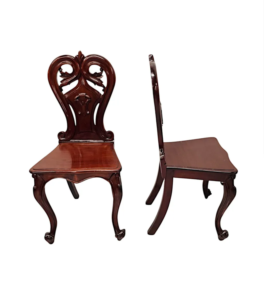 A Stunning Pair of 19th Century Hall Chairs