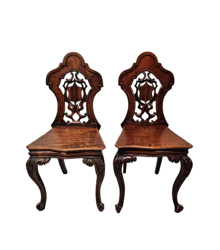  A Fabulous Pair of 19th Century Oak Hall Chairs