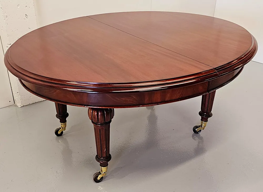 A Superb Large 19th Century D-End Extendable Dining Table
