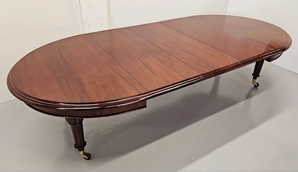 A Superb Large 19th Century D-End Extendable Dining Table