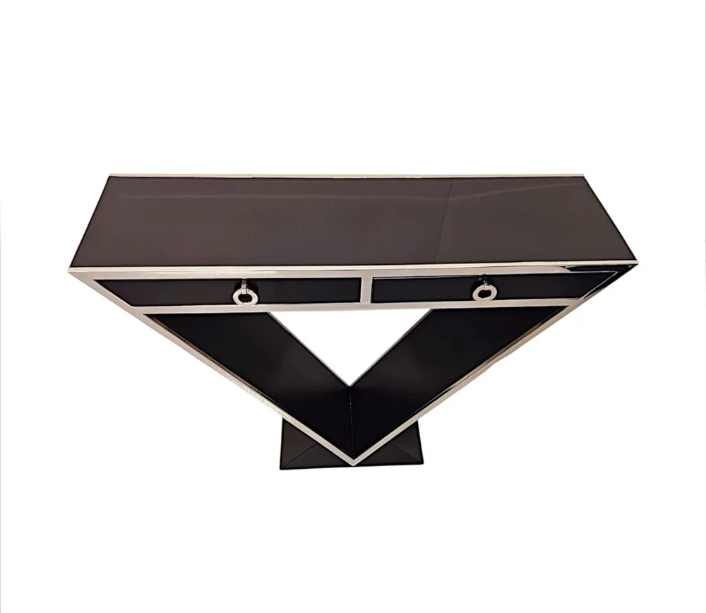 A Stunning Art Deco Style Black Laquered Timber and Chrome Console Table