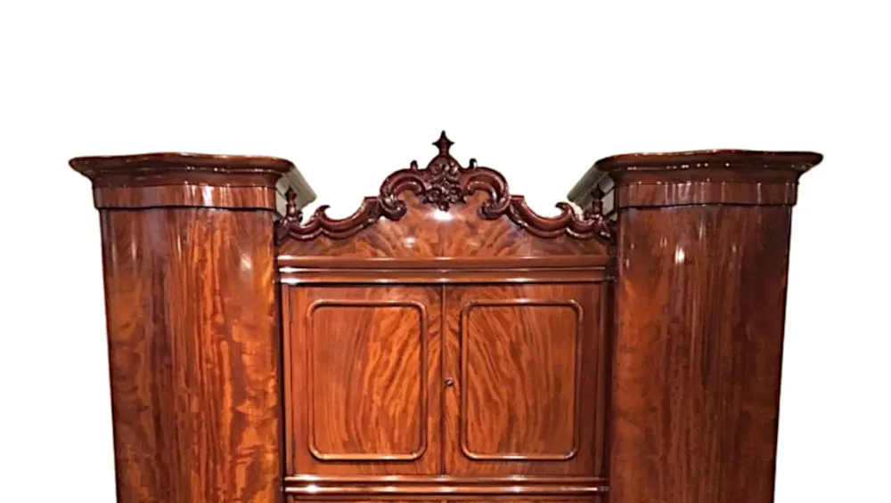 A Very Rare 19th Century Flame Mahogany Wardrobe with Serpentine Doors