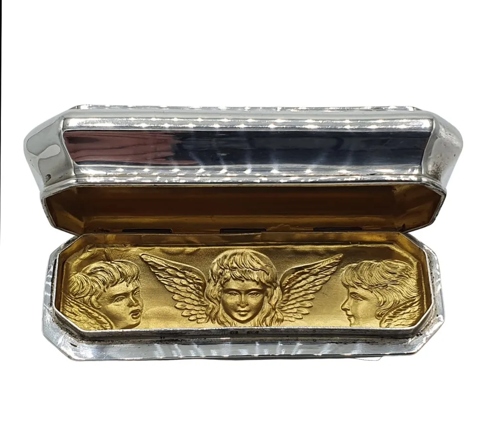 A Beautiful 19th Century Sterling Silver Box Embossed with Repousse Cherubs