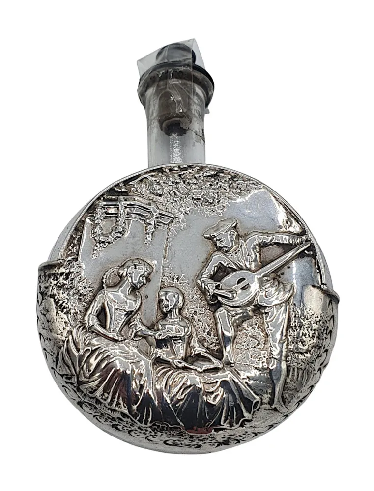 An Exquisite 19th Century Sterling Silver Bottle Holder and Perfume Bottle
