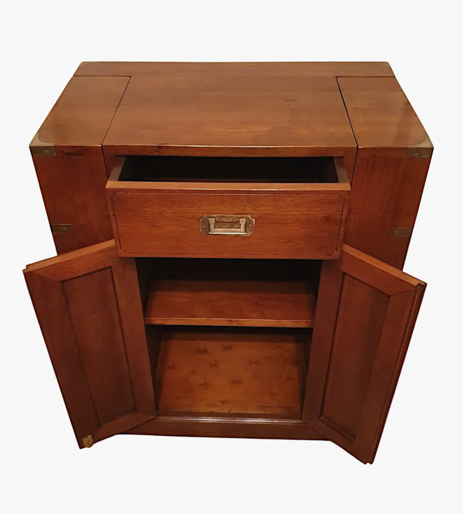 A Fine Quality 20th Century Cherrywood Drinks Cabinet in the Campaign Style 
