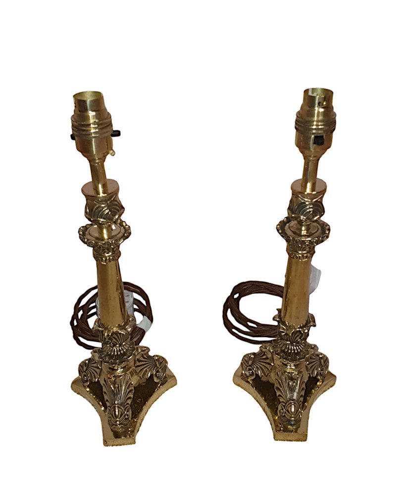 A Stunning Pair of 19th Century Brass Candle Sticks in the Empire Style Converted to Table Lamps