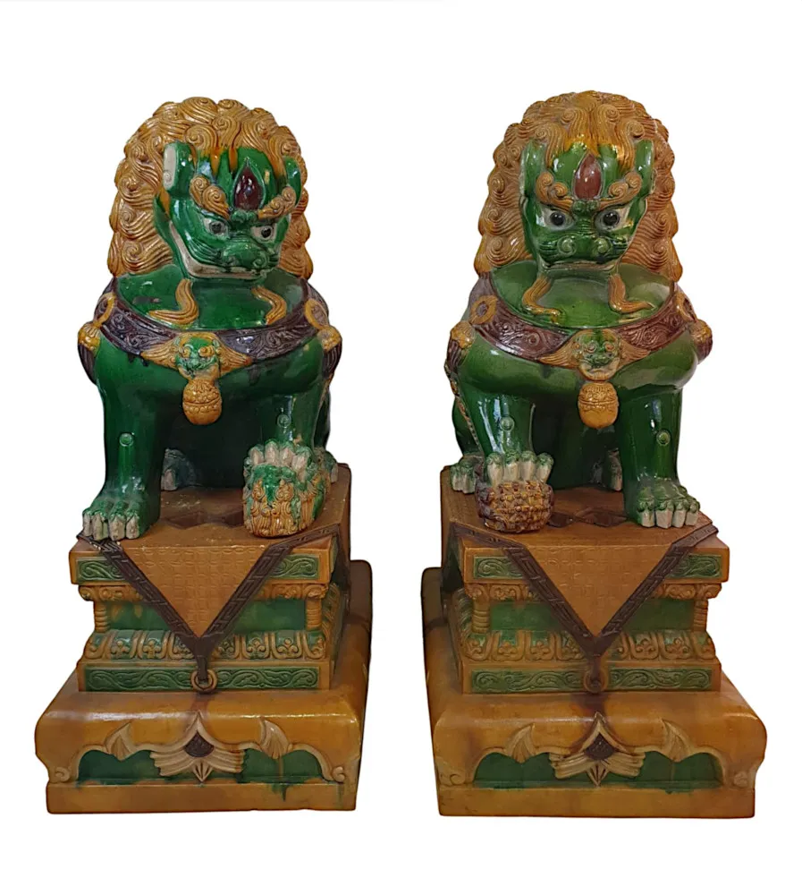 A Rare and Important Pair of Early 20th Century Chinese Export Foo Dogs