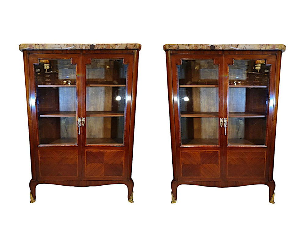 A Very Fine and Rare Pair of 19th Century Marble Top Bookcases