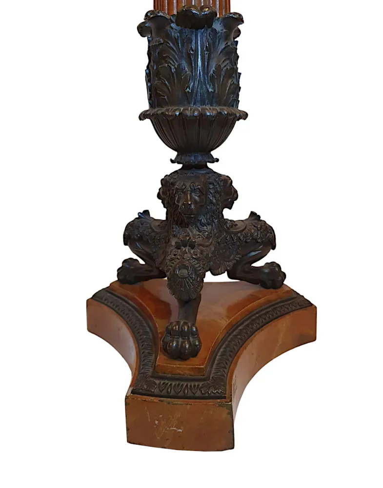 A Rare and Fine Pair of 19th Century Bronze Candelabra in the Empire Style