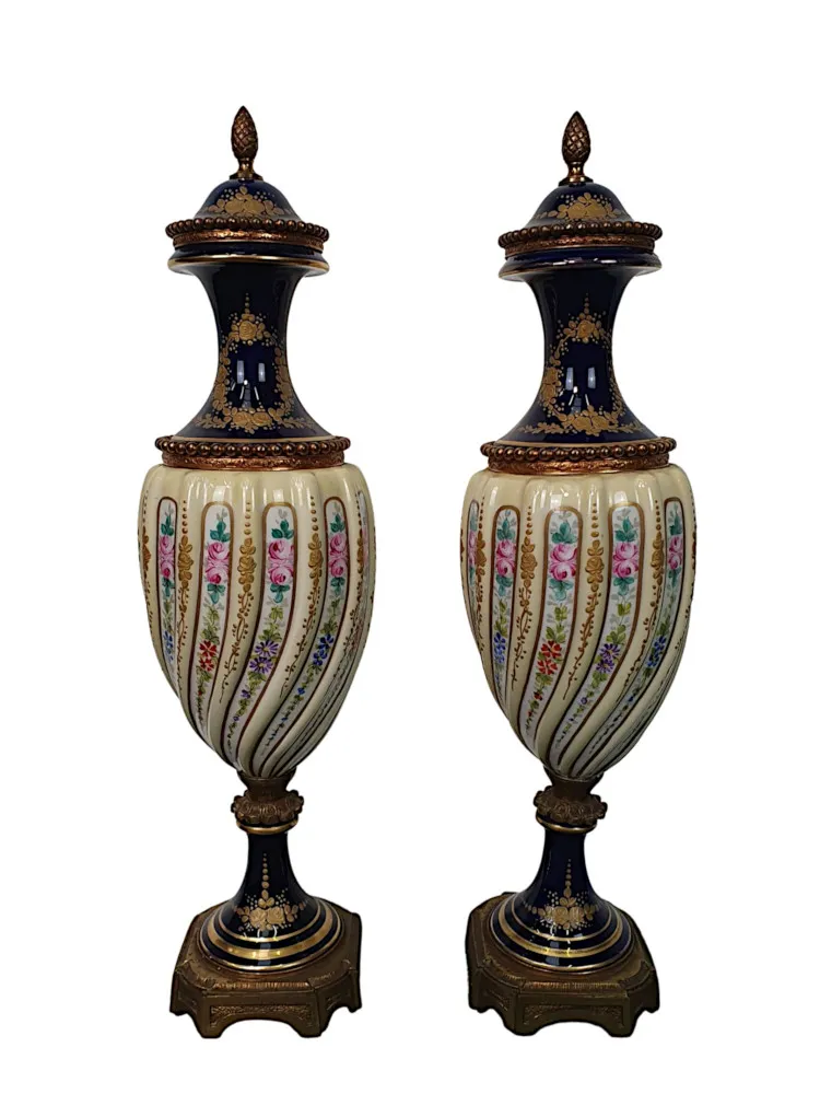 A Lovely Quality Pair of 19th Century Urns in the manner of Sevres