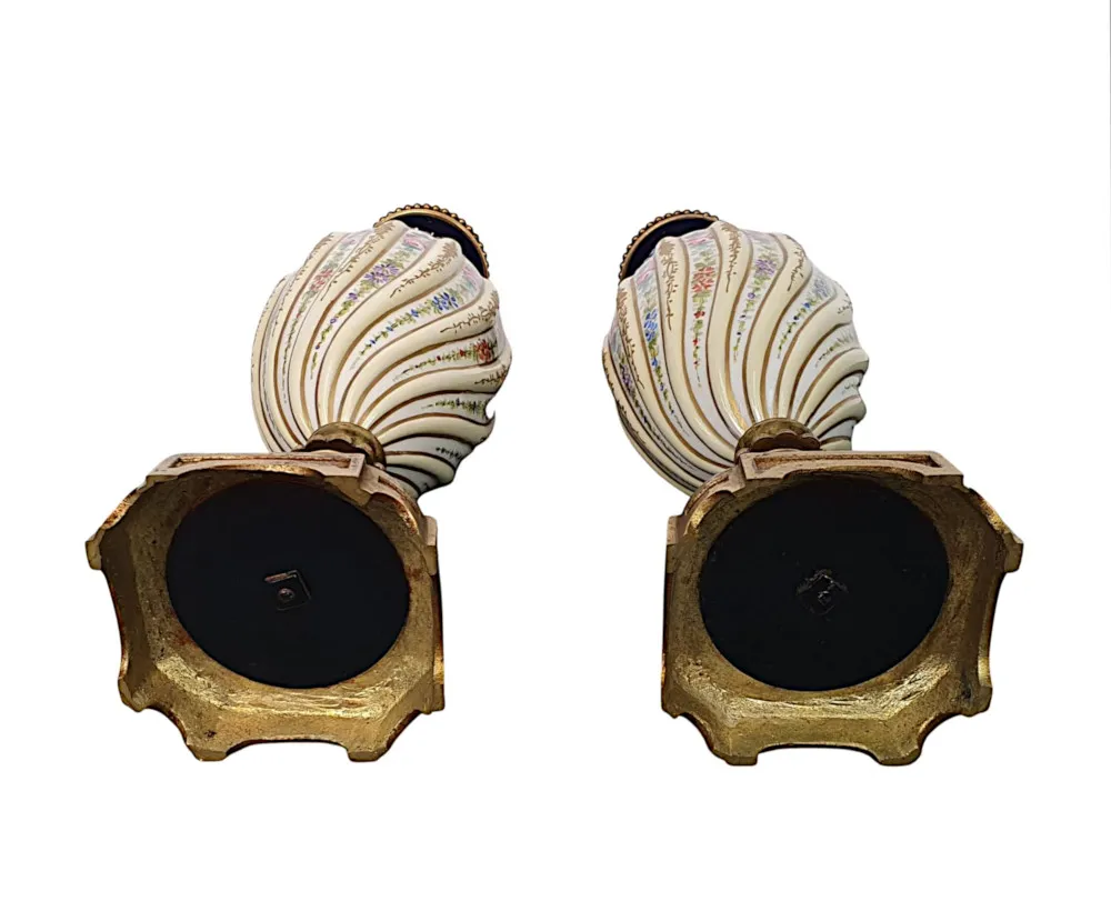 A Lovely Quality Pair of 19th Century Urns in the manner of Sevres