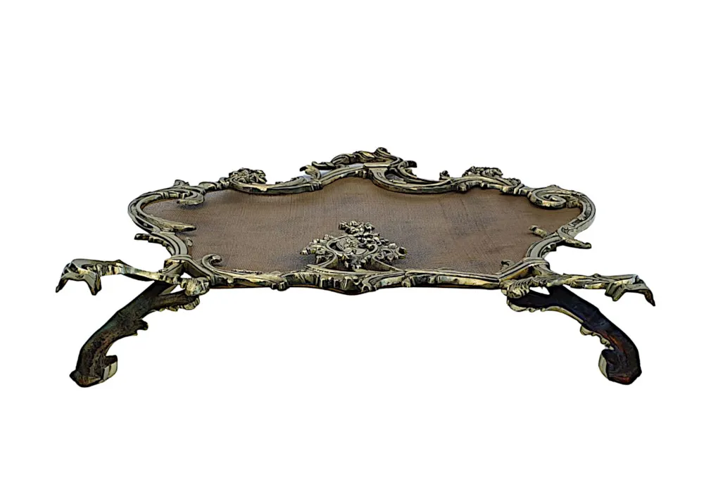 An Elegant 19th Century Brass Fire Screen in the Rococo Manner