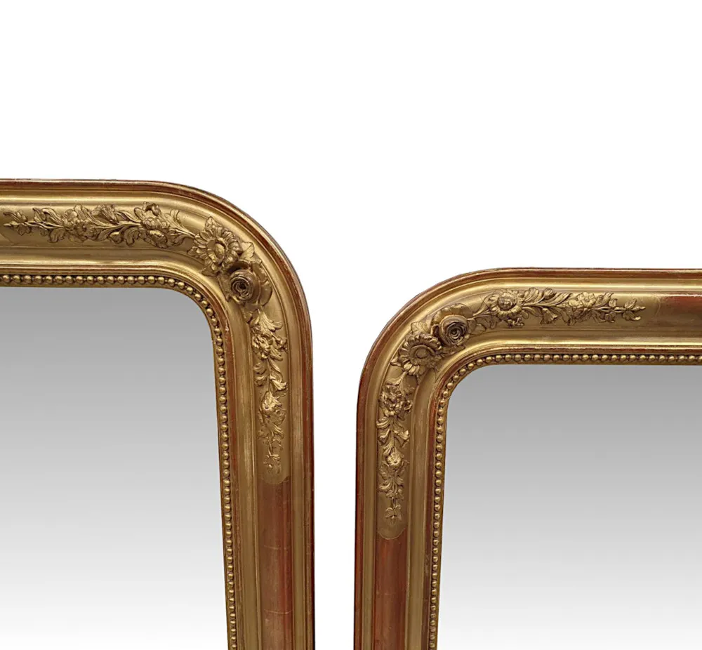 A Fabulous Near Pair of 19th Century Giltwood Overmantle Mirrors