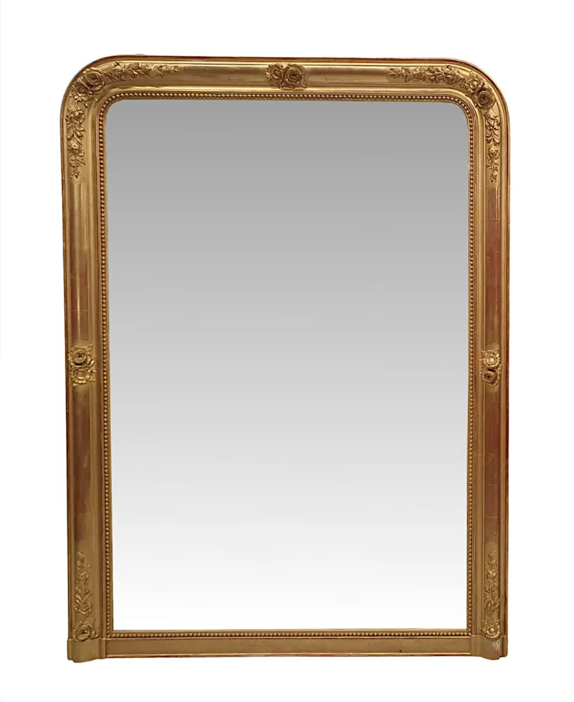 A Fabulous Near Pair of 19th Century Giltwood Overmantle Mirrors