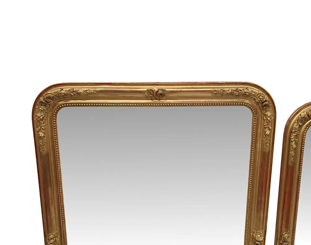A Fabulous Near Pair of 19th Century Giltwood Overmantle Mirrors