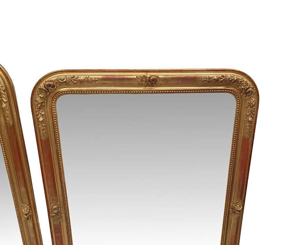 A Fabulous Near Pair of 19th Century Giltwood Overmantle Mirrors