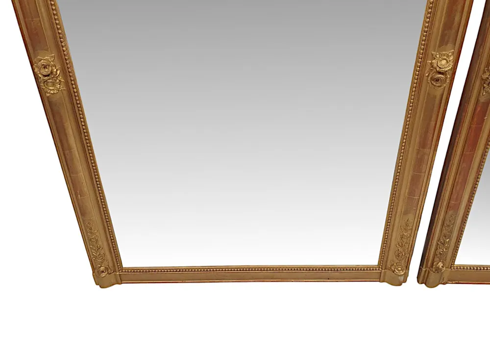 A Fabulous Near Pair of 19th Century Giltwood Overmantle Mirrors