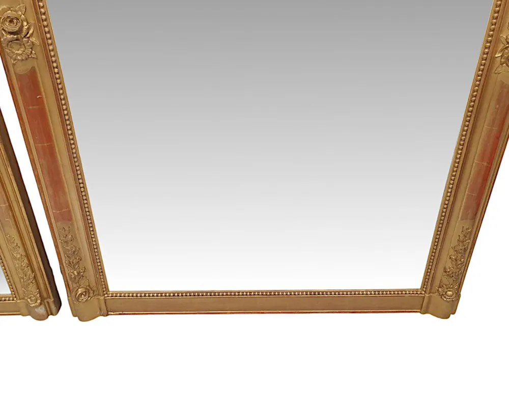 A Fabulous Near Pair of 19th Century Giltwood Overmantle Mirrors