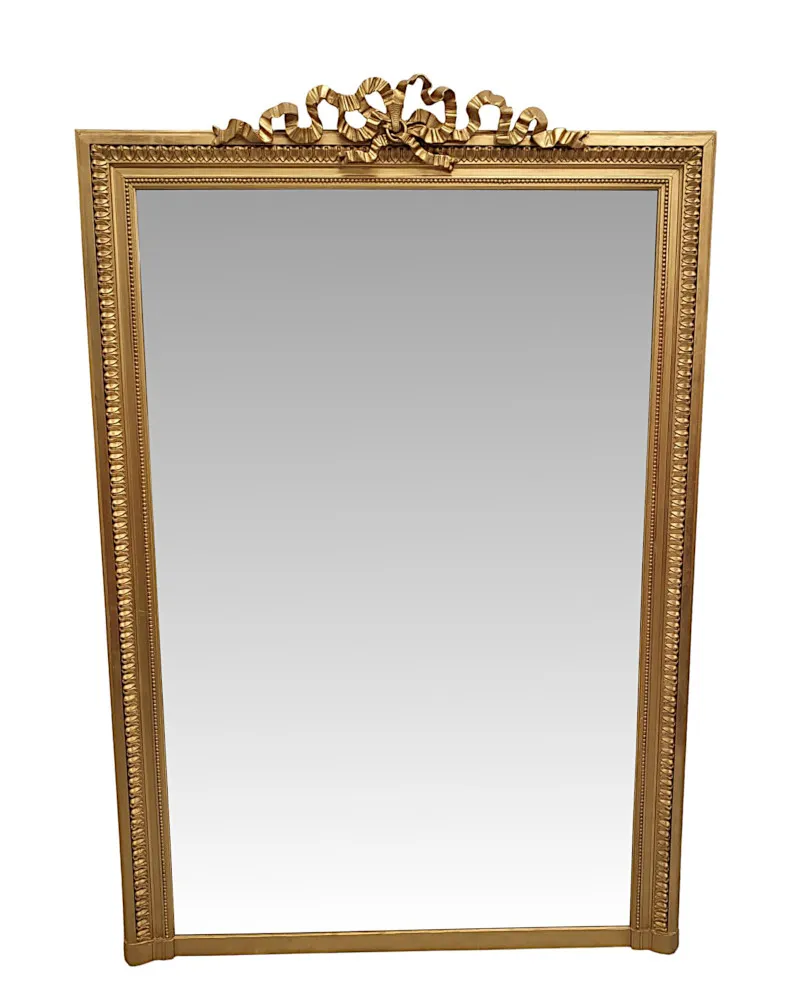 A Stunning 19th Century Giltwood Overmantle Mirror with Ribbon Detail