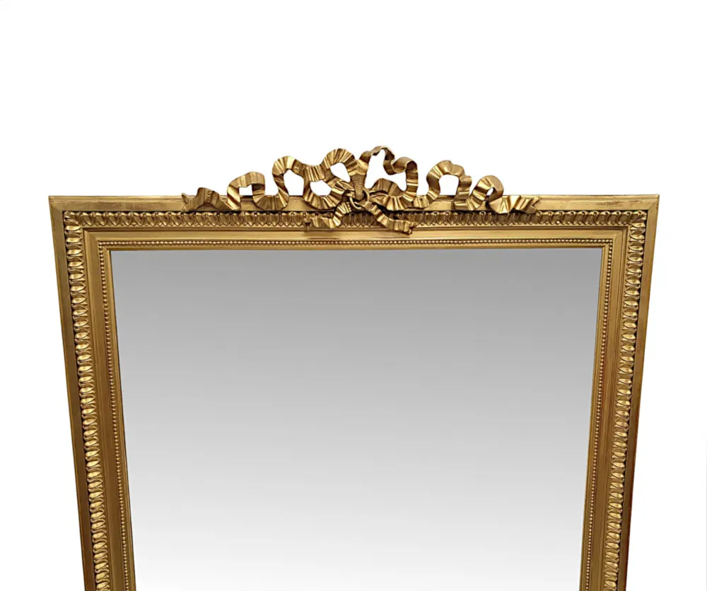 A Stunning 19th Century Giltwood Overmantle Mirror with Ribbon Detail