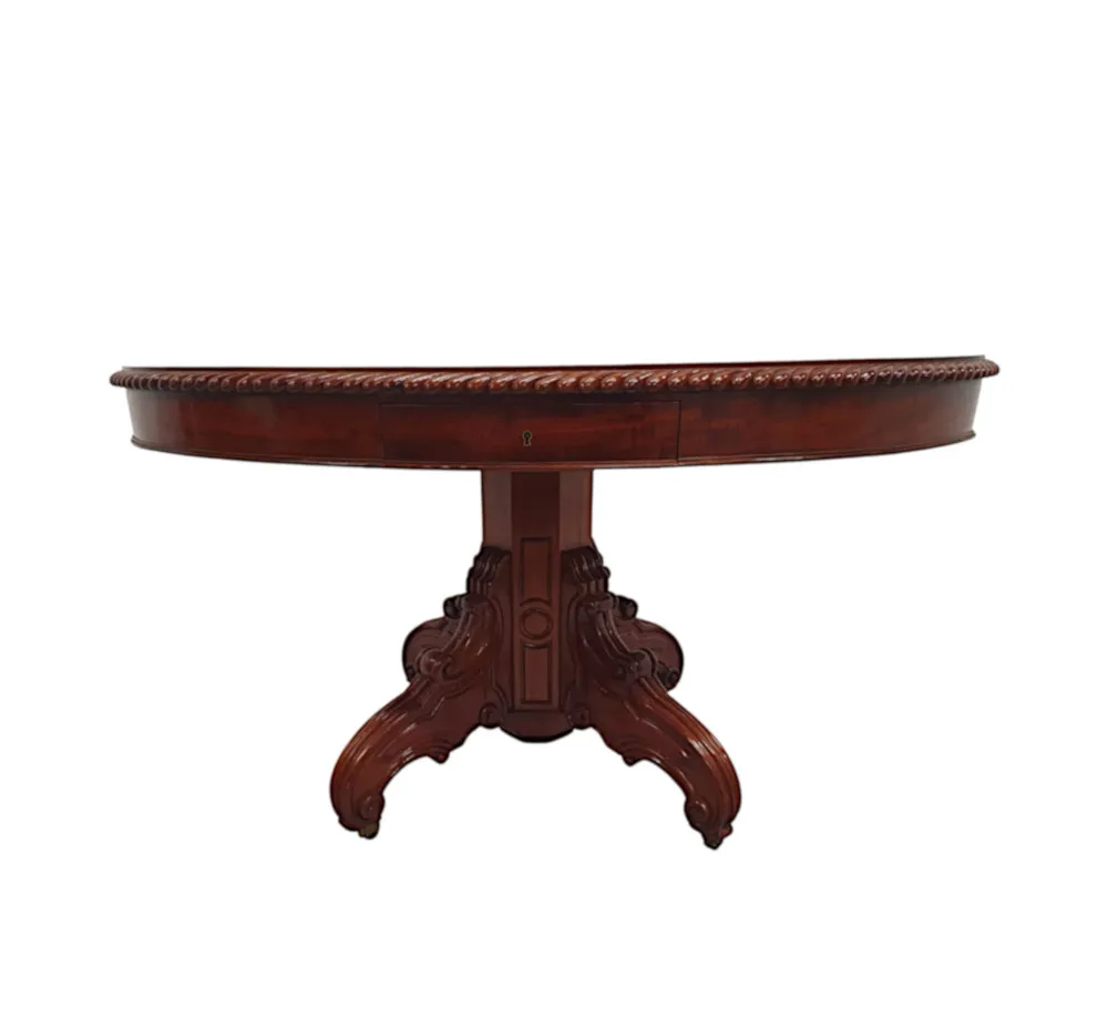 A Rare 19th Century Figured Mahogany Oval Drum Table 