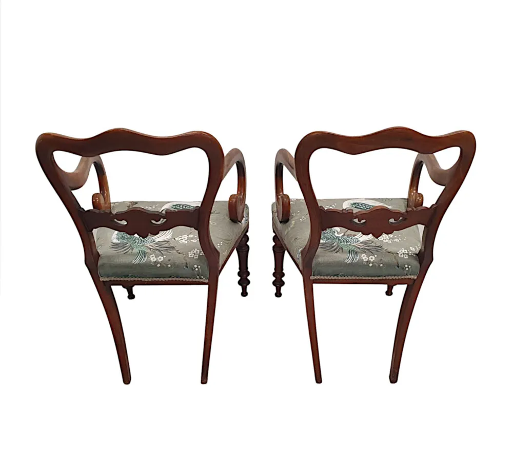 A Fine Pair of 19th Century Carver Armchairs