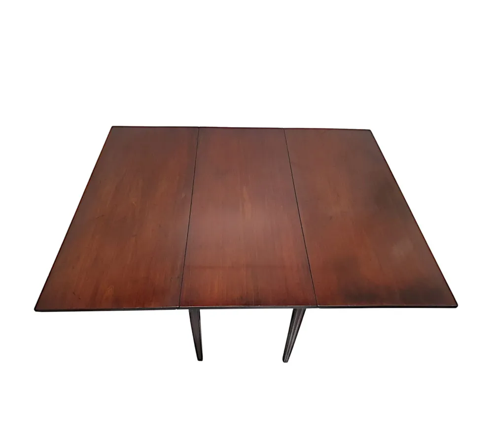 A Very Fine Irish Georgian Cuban Mahogany Drop Leaf Dining Table 