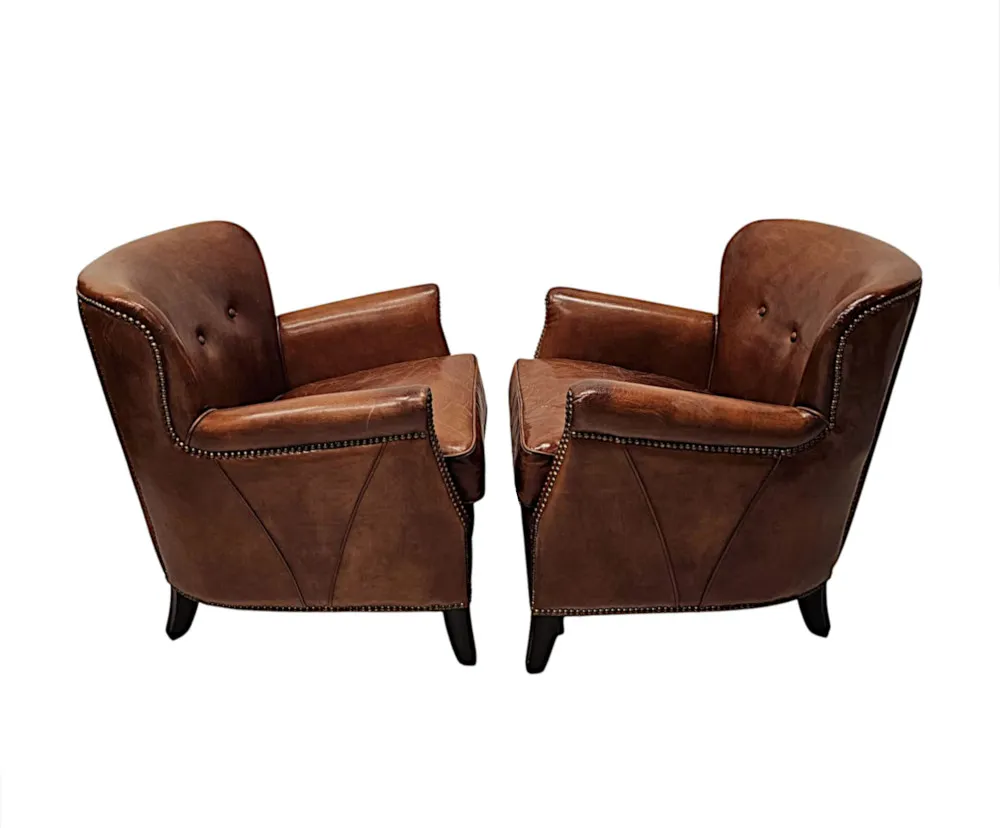  A Stunning Pair of Small Leather Club Armchairs in the Art Deco Style 