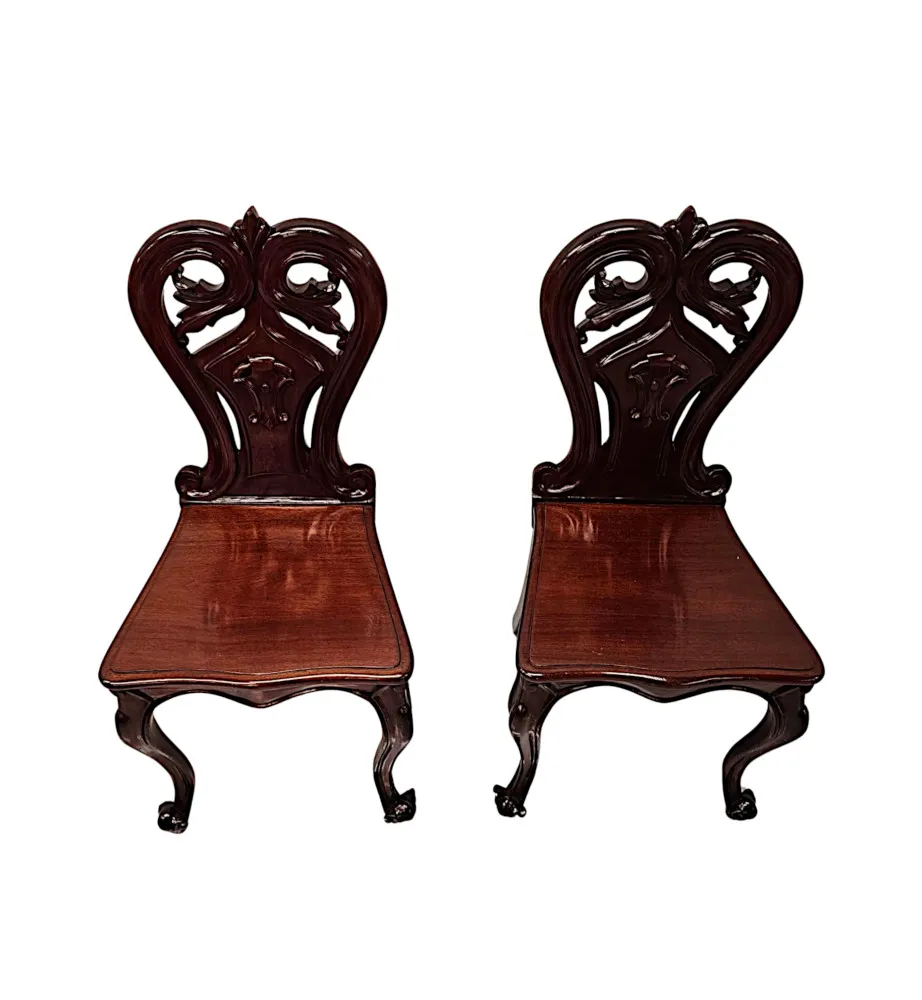A Stunning Pair of 19th Century Hall Chairs