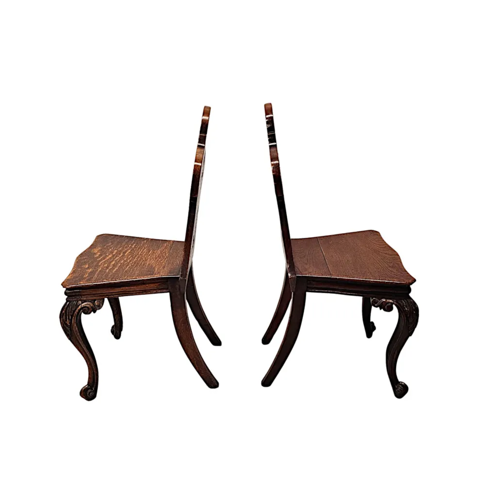  A Fabulous Pair of 19th Century Oak Hall Chairs