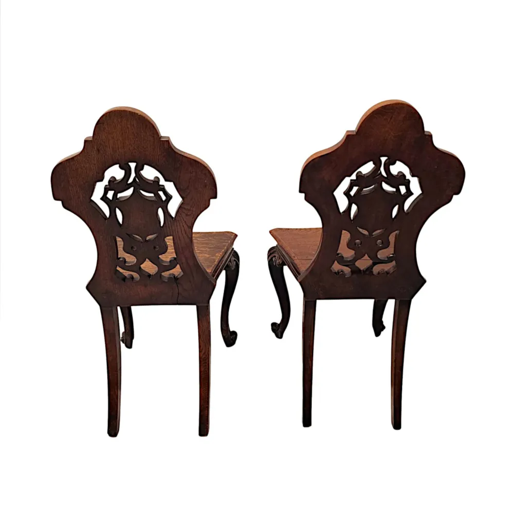  A Fabulous Pair of 19th Century Oak Hall Chairs