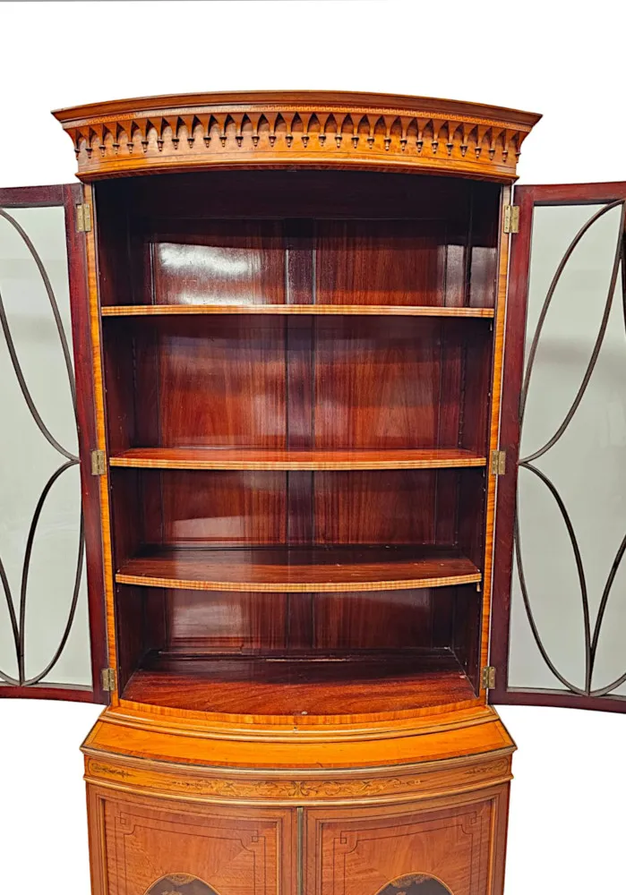 A Very Fine Edwardian Marquetry Inlaid Bowfronted Bookcase in the Manner of Edward and Roberts