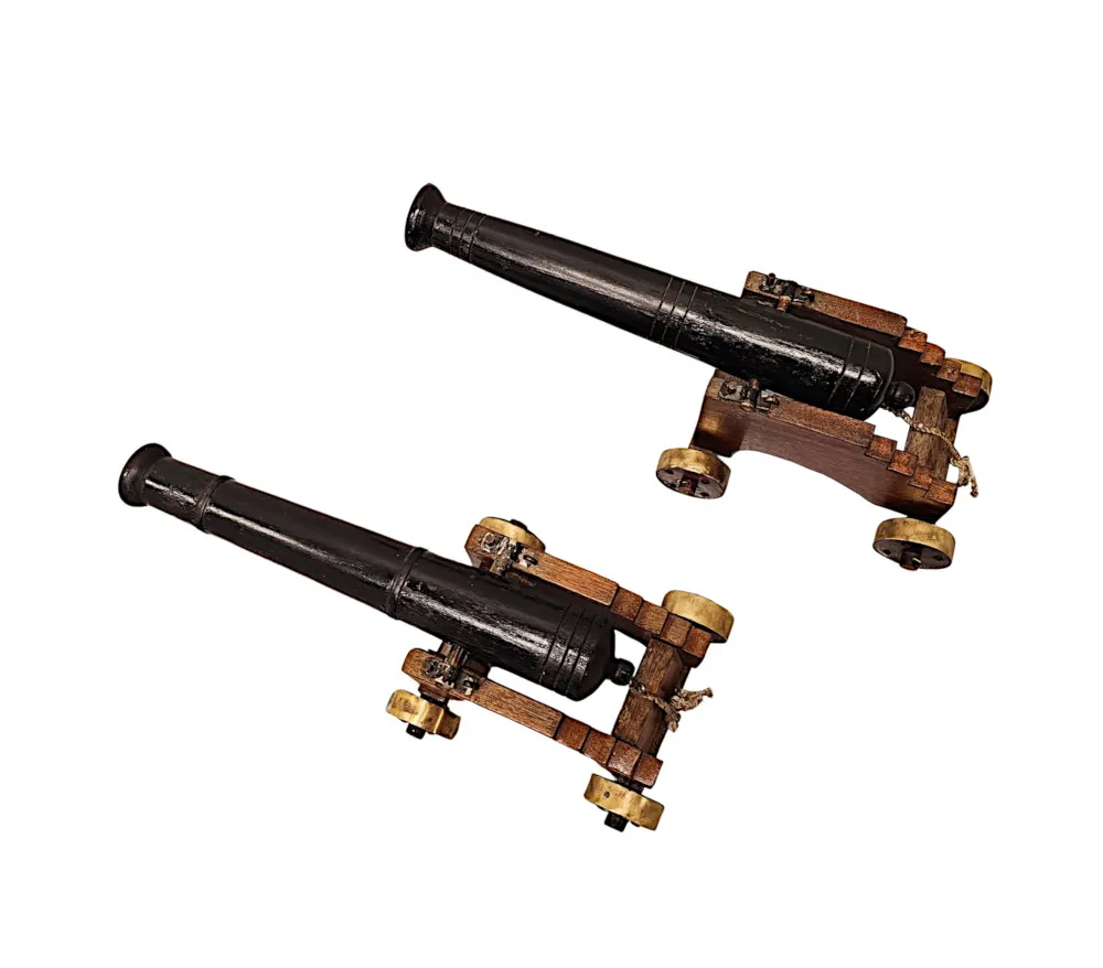  A Fabulous Pair of Late 19th Century Hand Made Miniature Wooden Cannons