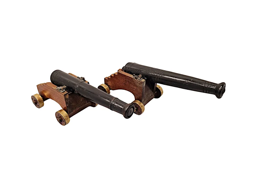  A Fabulous Pair of Late 19th Century Hand Made Miniature Wooden Cannons