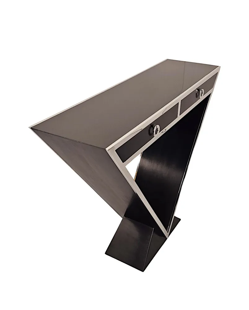 A Stunning Art Deco Style Black Laquered Timber and Chrome Console Table