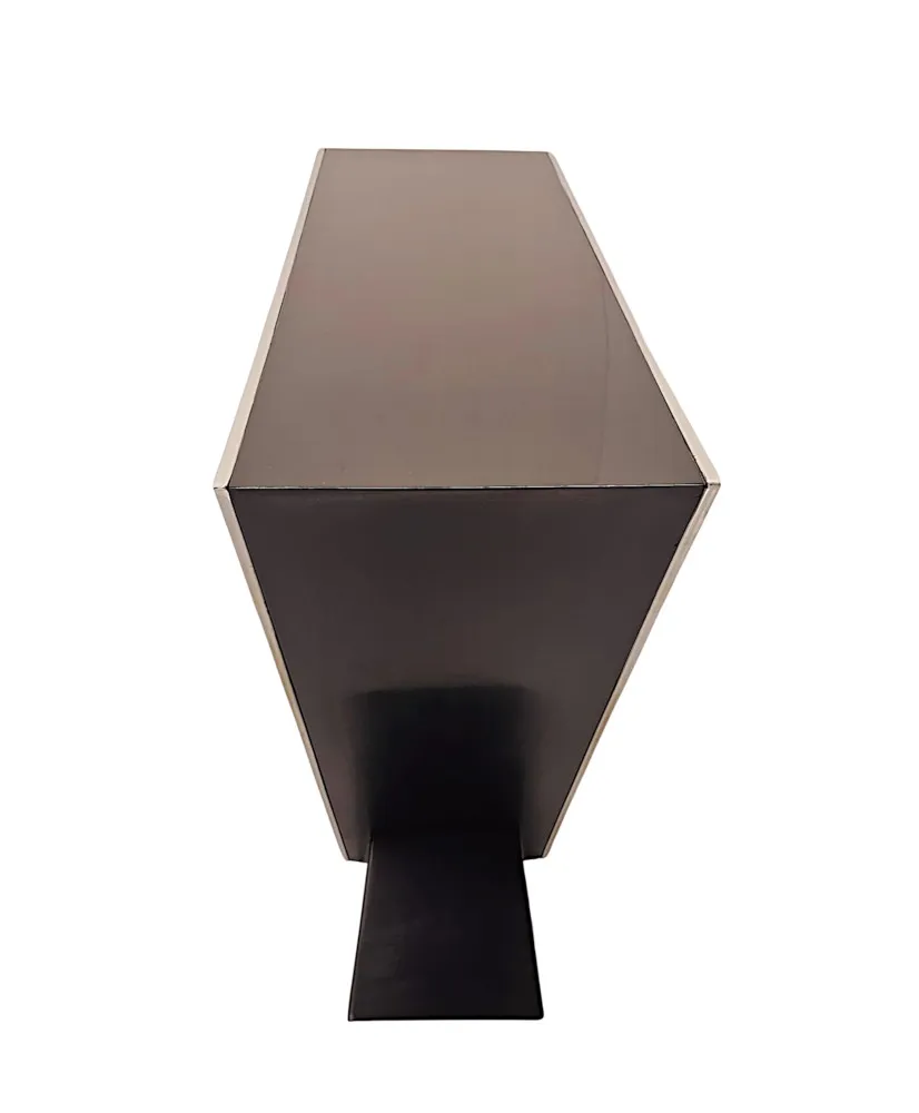 A Stunning Art Deco Style Black Laquered Timber and Chrome Console Table