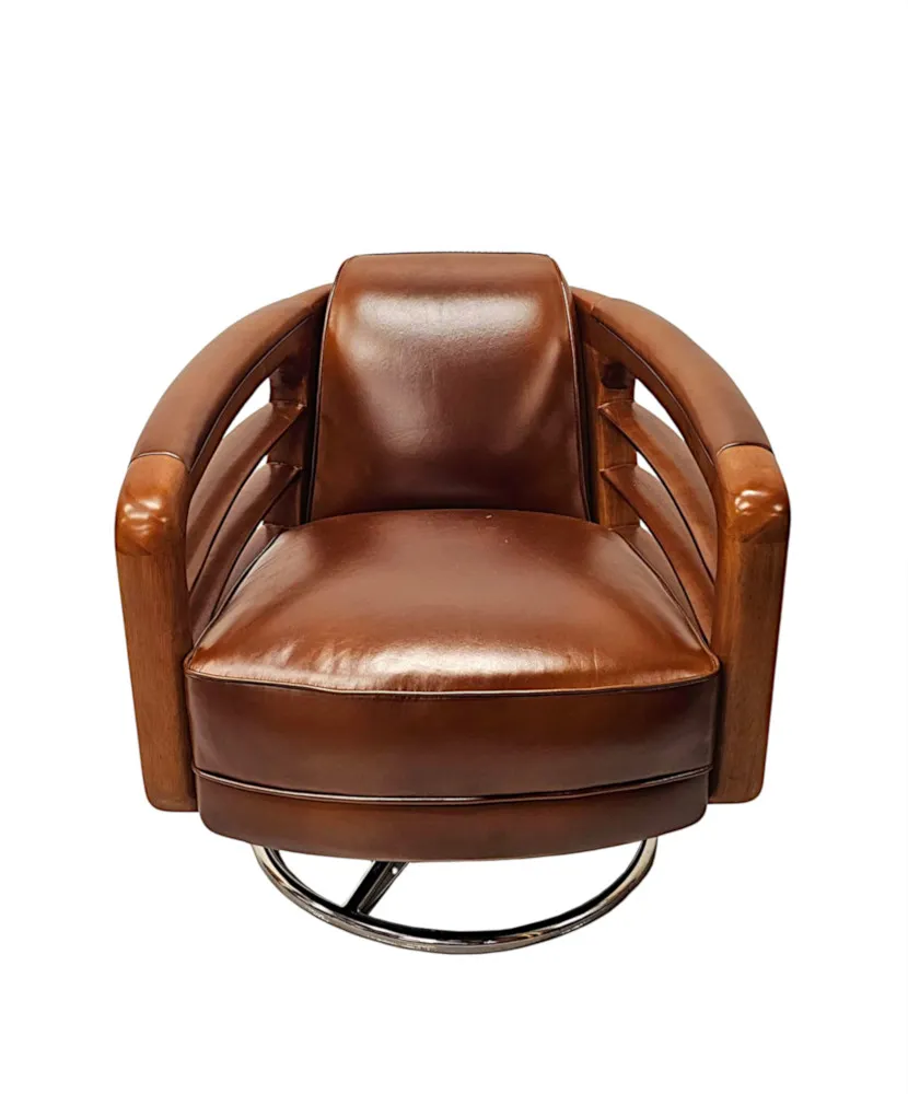 A Fabulous Hand Made Leather and Chrome Revolving Club Chair