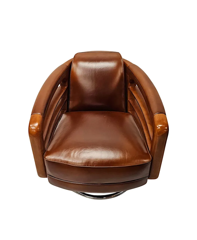 A Fabulous Hand Made Leather and Chrome Revolving Club Chair