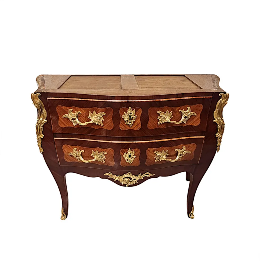  A Very Rare Pair of 19th Century Marble Top Bombe Shaped Chests or Commodes