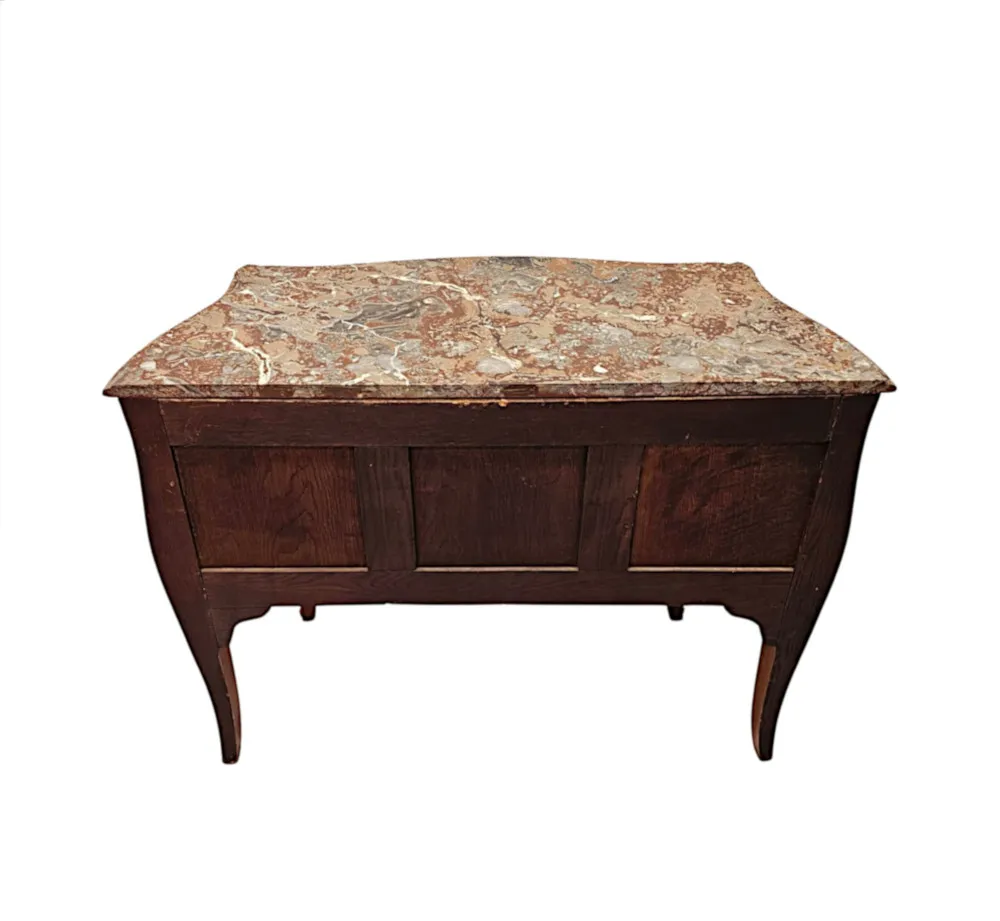  A Very Rare Pair of 19th Century Marble Top Bombe Shaped Chests or Commodes