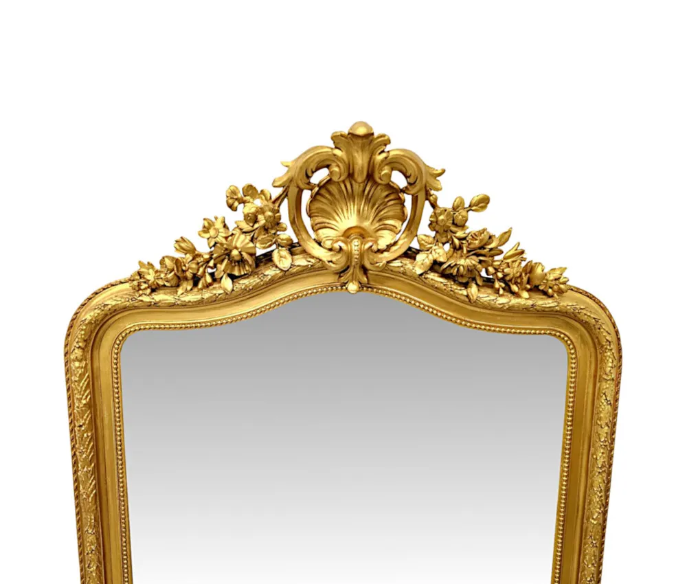 A Fabulous 19th Century Tall Giltwood Hall Mirror with Central Shell Cartouche