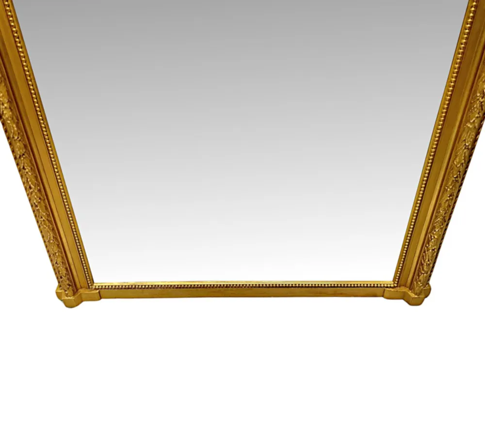 A Fabulous 19th Century Tall Giltwood Hall Mirror with Central Shell Cartouche