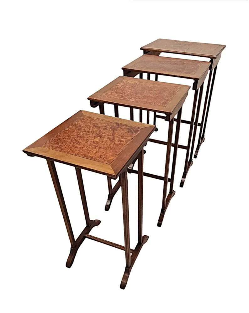 A Stunning Edwardian Inlaid Nest of Four Tables