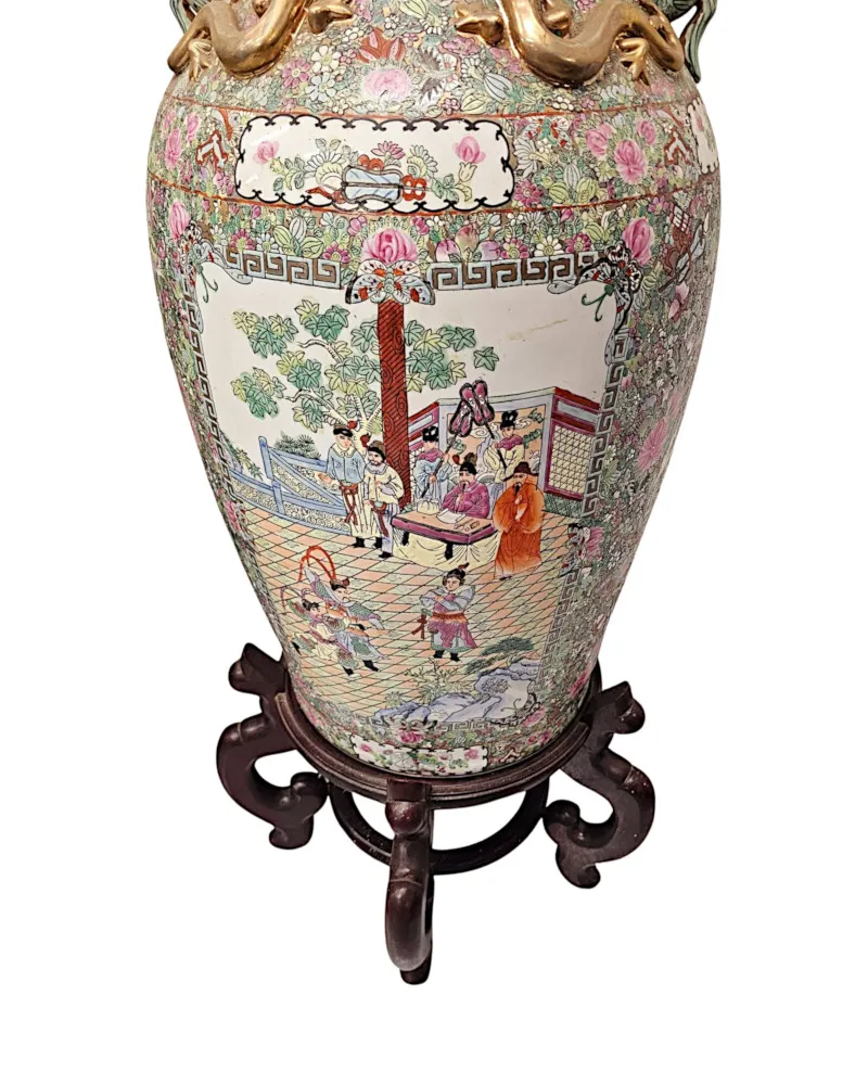 A Very Fine and Impressive Pair of Early 20th Century Oriental Hand Painted Urns on Timber Stands