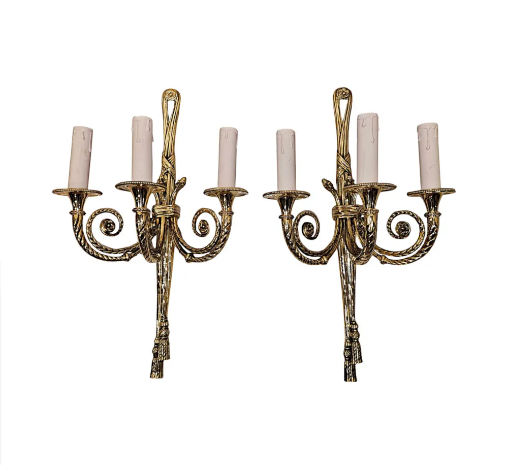 A Fabulous Set of Four Early 20th Century Three Branch Brass Wall Lights