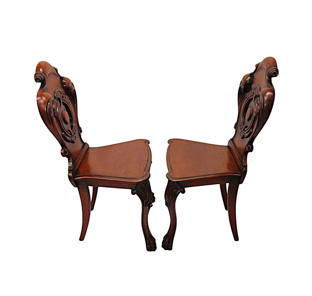 A Very Fine Pair of 19th Century Hall Chairs With Paw Foot 