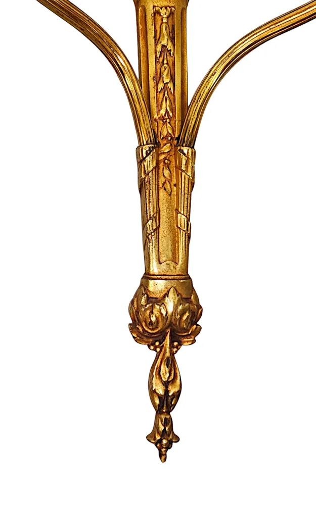 A Stunning Pair of Early 20th Century Gilded Bronze Wall Lights