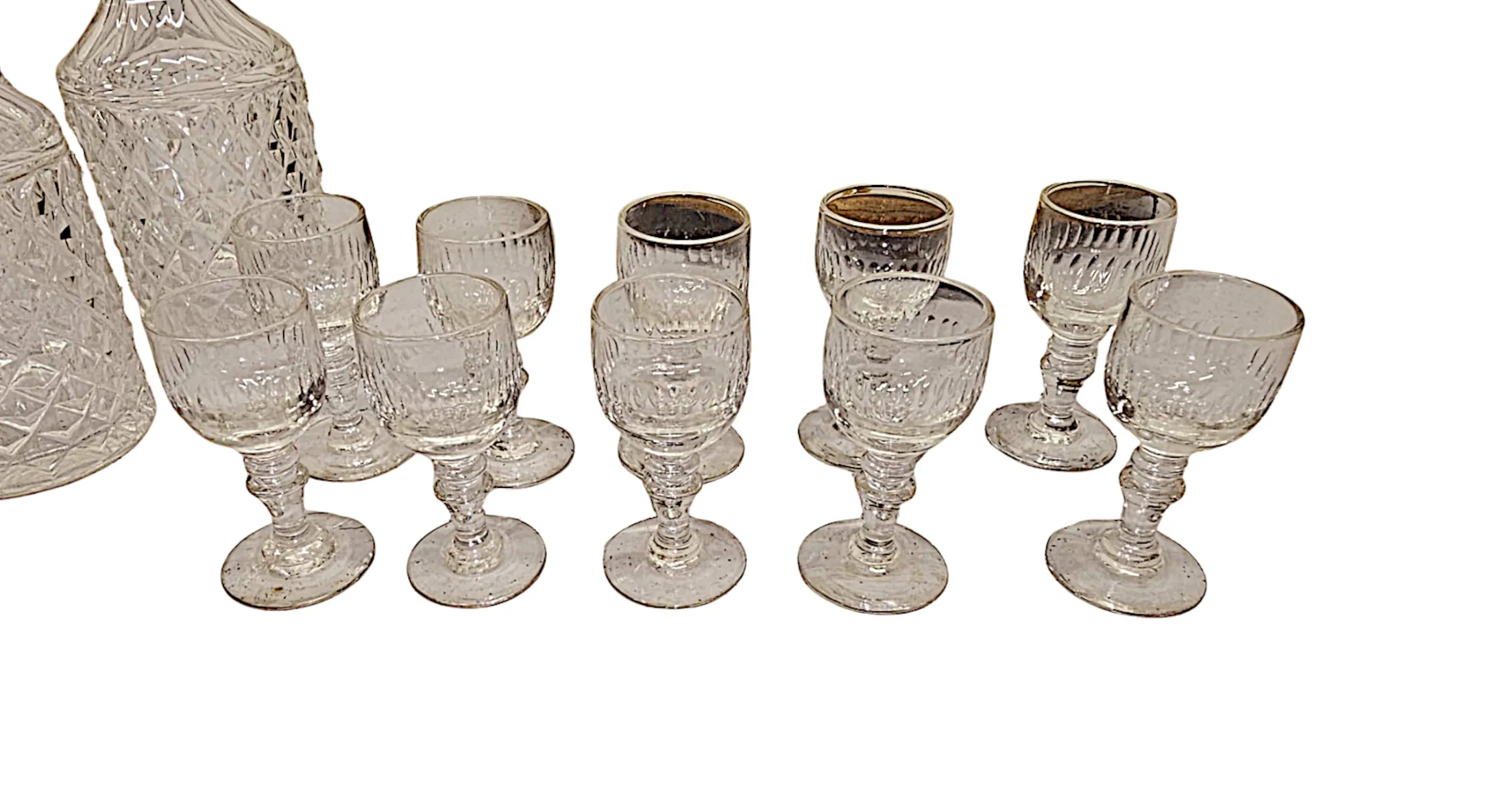 A Very Fine 19th Century French Ormolu and Cut Class Cave A Liqueur Tantalus Set