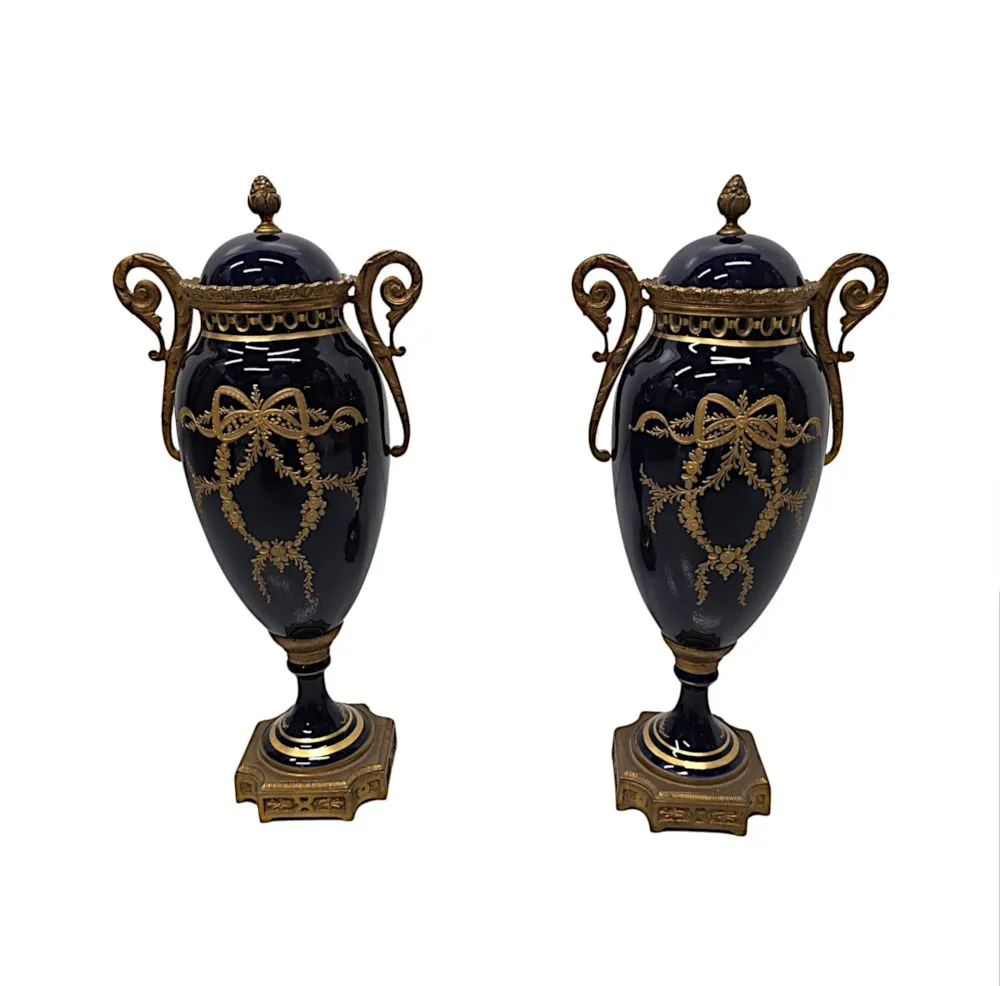  A Very Fine Pair of 19th Century Hand Painted Sevres Style Lidded Urns